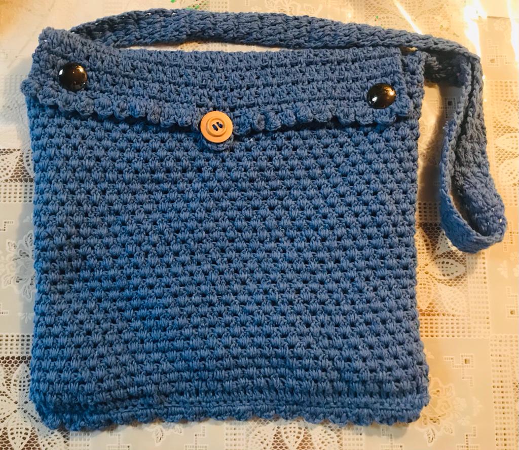 Bolso celeste tres botones